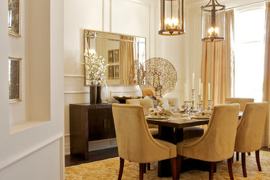 Example of a classic dark wood floor dining room design in Toronto with white walls