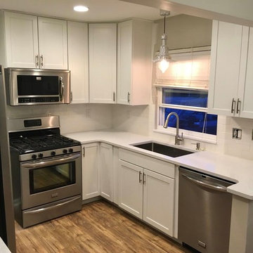 Kitchen Cabinets Refinished from Maple to White