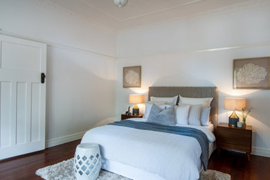 Design ideas for a transitional bedroom in Brisbane.