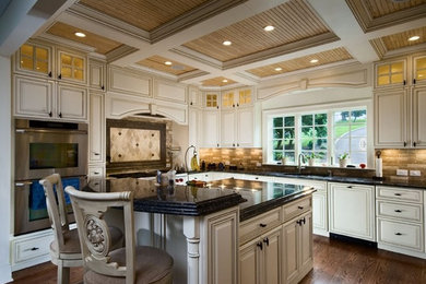 Mid-sized minimalist kitchen photo in Boston with an island