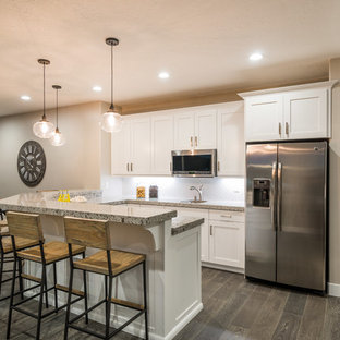 Design ideas for a traditional basement in Salt Lake City with beige walls and porcelain flooring.