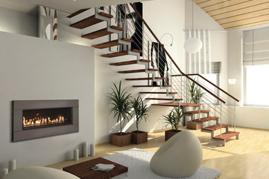 Inspiration for a large modern open concept and formal light wood floor living room remodel in Calgary with white walls, a ribbon fireplace, a metal fireplace and no tv