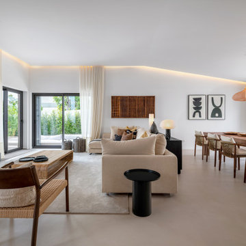 Open-plan living room with dining area and garden view, Alfragide