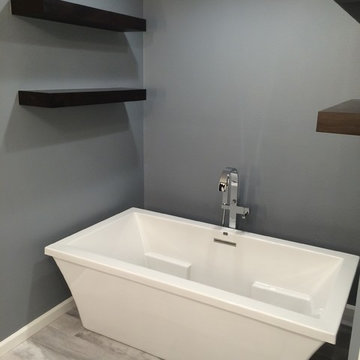 Free-Standing Vessel Tub with Floating Shelves Above