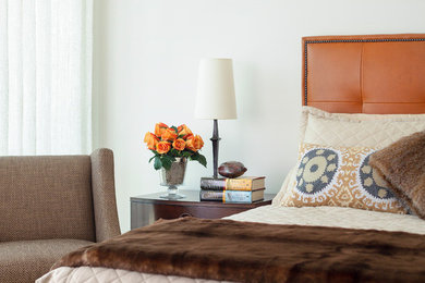 Example of a transitional bedroom design in Toronto