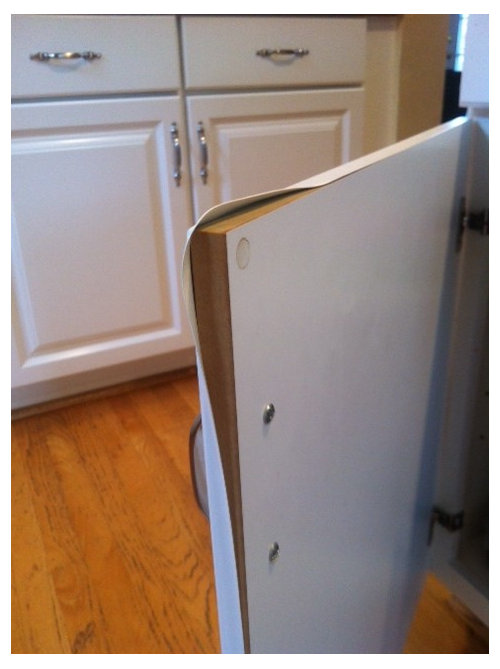 My Oven Melted The Coating On Cabinets, How To Repair Vinyl Wrap Kitchen Cupboards