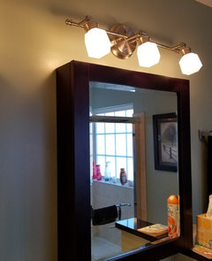 vanity lights over surface medicine cabinet