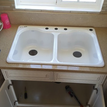 New Sink, New Water Faucet, New Water pipes, New Drain line & Garbage Disposal.