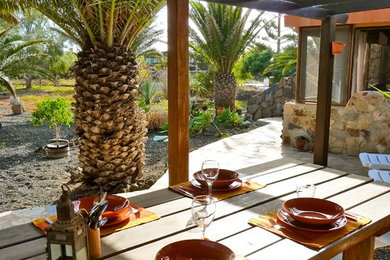 Patio - mediterranean patio idea in Other