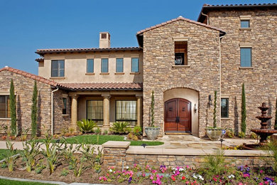 Mediterranean exterior home idea in Los Angeles
