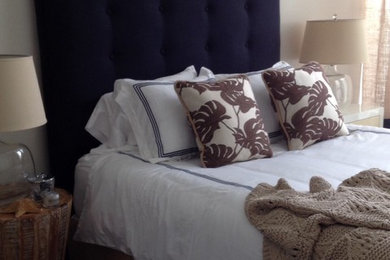 Bedroom - mid-sized contemporary guest dark wood floor bedroom idea in Charlotte with beige walls and no fireplace