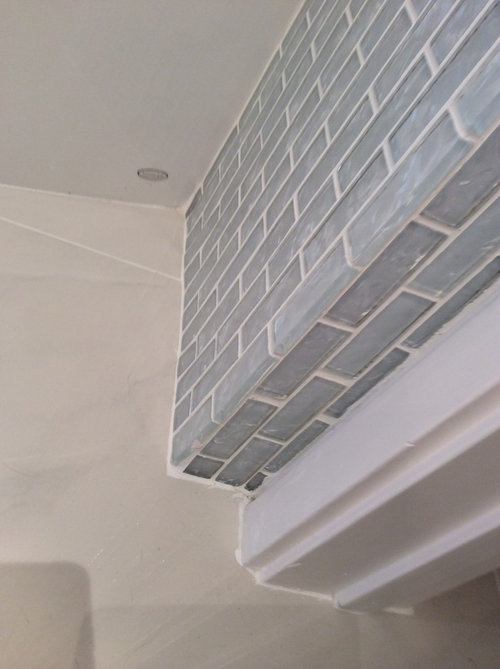 Marble tile baseboards look unfinished