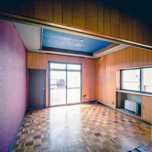 Scandinavian enclosed home cinema in Other with brown walls, plywood flooring and brown floors.