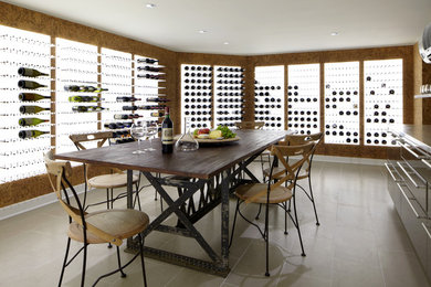 Design ideas for a large contemporary wine cellar in New York with ceramic floors and storage racks.