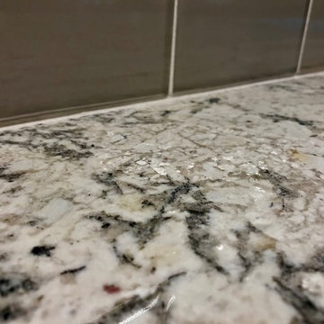 Dura Supreme Cabinets Knotty Alder Butternut Romanix Granite Galley Kitchen