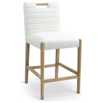 Meridian Furniture - Aimee Upholstered Counter Stool, Cream, Vegan Leather, Natural Oak Finish - A perfect fusion of modern elegance and eco-friendly luxury is the Aimee cream vegan leather counter stool. Upholstered in sleek vegan leather, this counter-height stool offers a chic, contemporary look while maintaining a commitment to sustainable living. The padded, quilted design featuring solid natural oak wood legs creates a stunning contrast between its soft upholstery and minimalist frame.