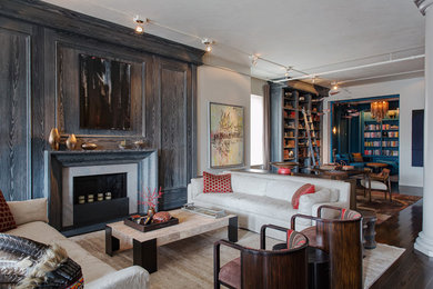 Living room - transitional dark wood floor and brown floor living room idea with white walls and a standard fireplace