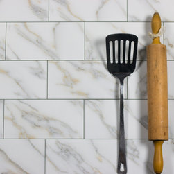 Abolos - Nature 4 in x 8 in Glass Subway Tile in Calacatta Gold - Mosaic Tile