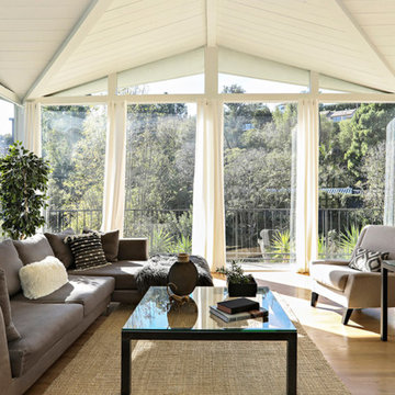 White curtains frame a very Hollywood view