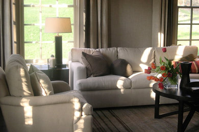 Example of a mid-sized transitional open concept carpeted living room design in New York with no fireplace and no tv