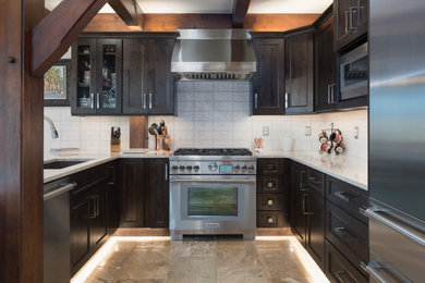 Example of a mountain style kitchen design in Denver