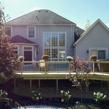 Deck and Unilock Paver Patio with Firepit & Landscaping