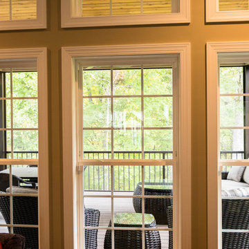 Screen Room Addition with Retractable Screens, Outdoor Kitchen, and Patio