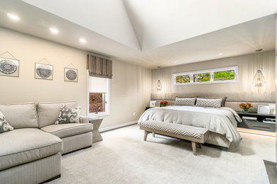 Example of a transitional bedroom design in Columbus