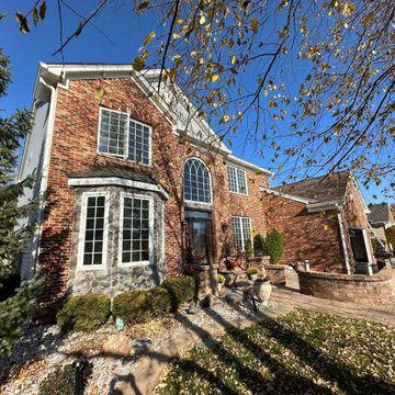 ORANGE MANSION - Front Facade and Landscaping View