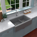 Karran USA - Karran Farmhouse/Apron-Front Quartz 34" Double Offset Bowl Sink, Grey - This classic farmhouse design with its deep 9-1/4" apron blends function and form beautifully, and will look incredible in your kitchen. It is manufactured from an extremely durable quartz composite material that will provide years of trouble-free use. This practical design is available in a selection of 6 elegant color choices to compliment any decor.