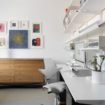 Eclectic White Home Office with Modular Wall Storage