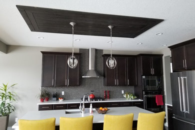 Mid-sized kitchen photo in Calgary