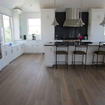 MONTAUK: WIDE PLANK ENGINEERED INSTALLED/WHITE OAK INSTALLED/FINISHED IN BEDRMS