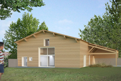 Cette photo montre une façade de maison beige en bois et bardage à clin de taille moyenne et à deux étages et plus avec un toit à deux pans, un toit en tuile et un toit rouge.