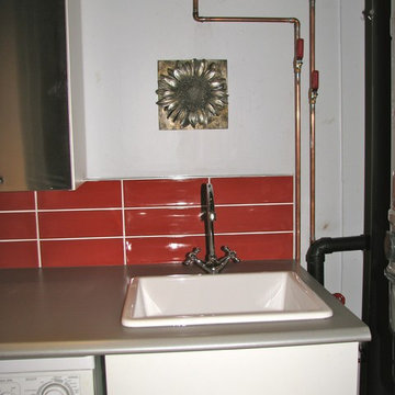Exposed Pipes with Porcelain Sink