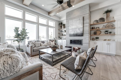 Family room - family room idea in Salt Lake City with a concrete fireplace