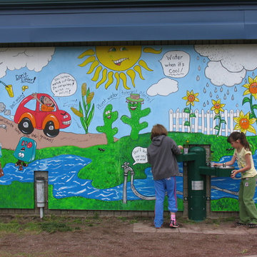Mural done by students and local artist adjacent to play garden
