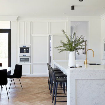 Sleek, White, Quartz-Embellished Kitchen