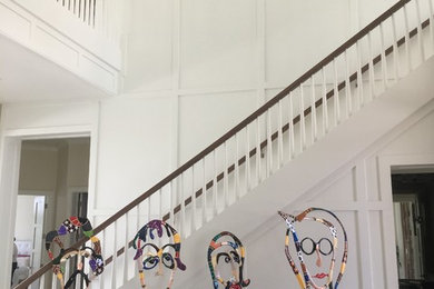 Example of a mid-sized minimalist straight wood railing staircase design in Miami
