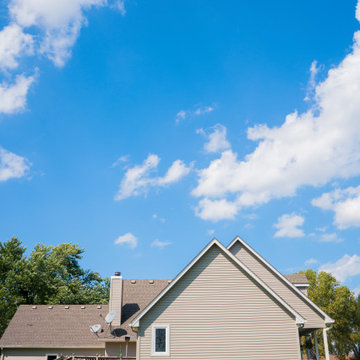 Seamless Polymer Siding in Mountain Clay w/ Energy Efficient Replacement Windows
