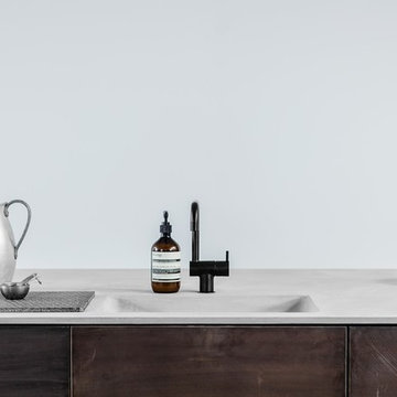 Concrete worktop and brass "tarnished" fronts