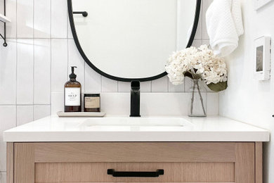 Minimalist powder room photo in Toronto