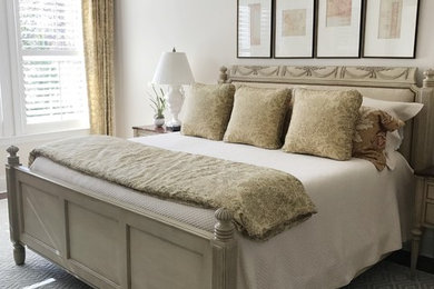 Bedroom - mid-sized transitional master medium tone wood floor and brown floor bedroom idea in Charlotte with beige walls