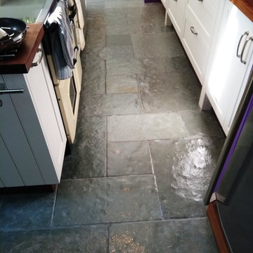 Raspberry Stained Flagstone Floor Cleaned and Sealed in Dursley