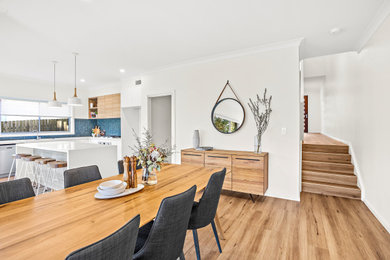 This is an example of a contemporary dining room in Wollongong.