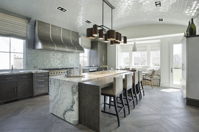 Medium tone wood floor kitchen photo in New York