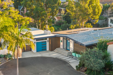 Inspiration for a 1960s house exterior remodel in San Diego