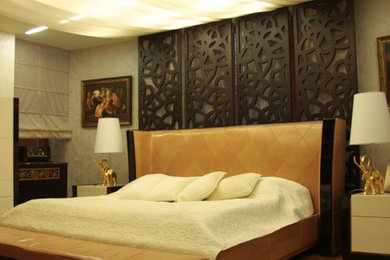 Large transitional master medium tone wood floor bedroom photo in Los Angeles with no fireplace