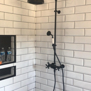 Mat Black Bathroom Fixtures for a White Backsplash