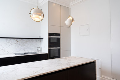 This is an example of a small modern kitchen in London.